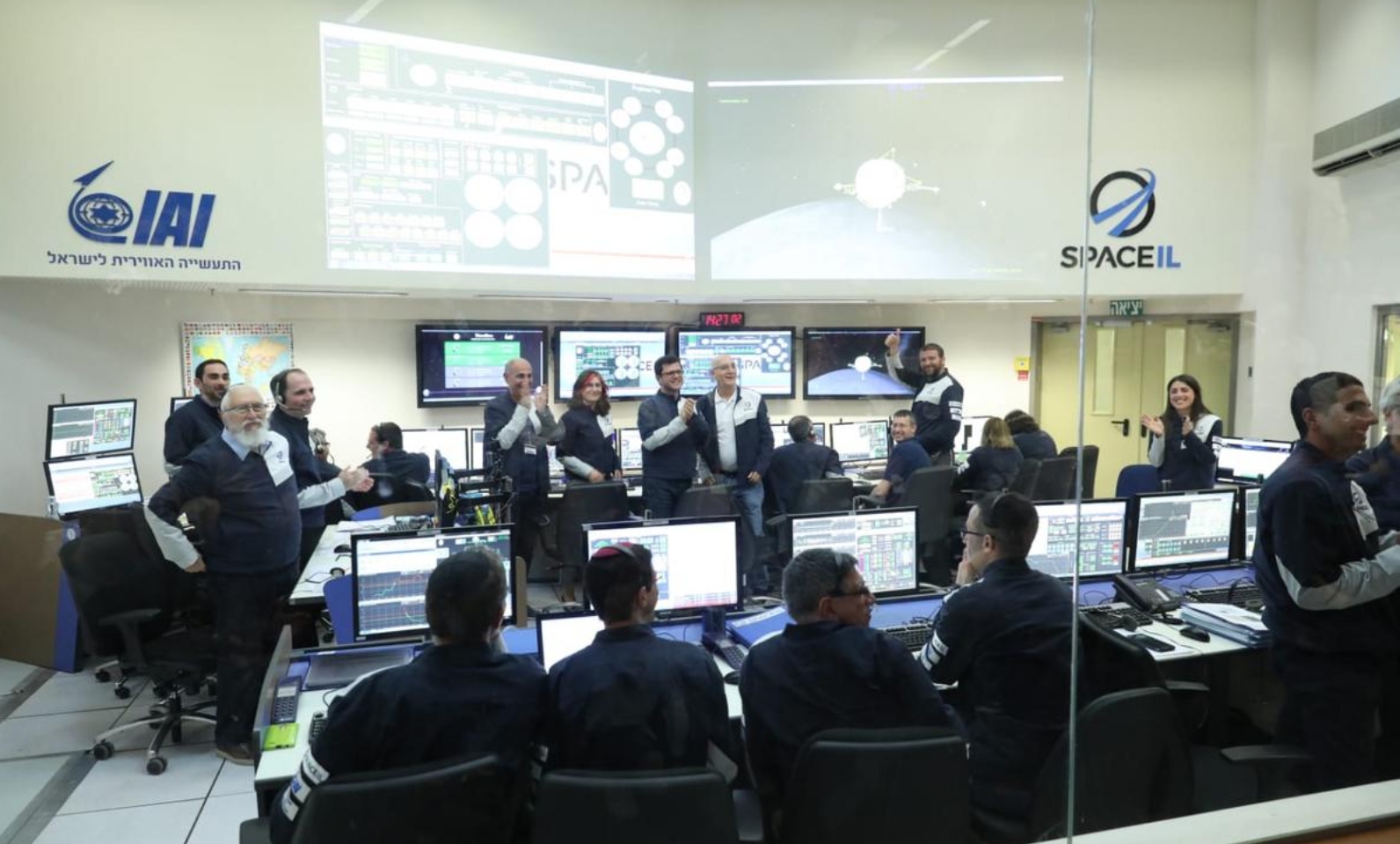 SpaceIL and IAI engineers celebrating lunar capture on April 4, 2019. Photo by Eliran Avital