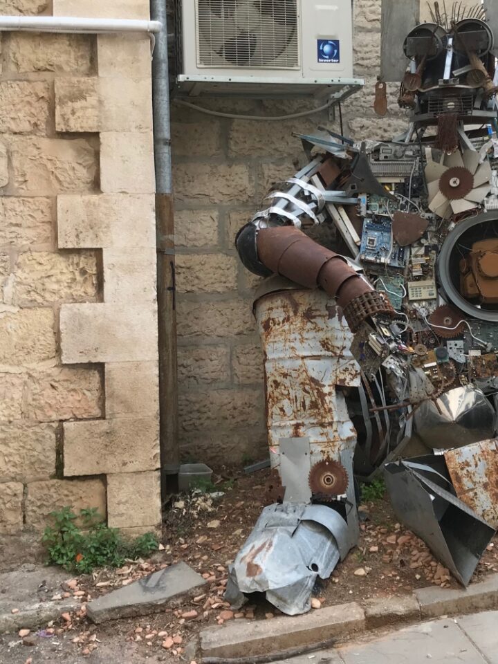 This sculpture consists of scrap materials in the yard of the abandoned building that became Hamiffal art and culture center in 2016. Photo by Abigail Klein Leichman
