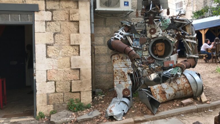This sculpture consists of scrap materials in the yard of the abandoned building that became Hamiffal art and culture center in 2016. Photo by Abigail Klein Leichman