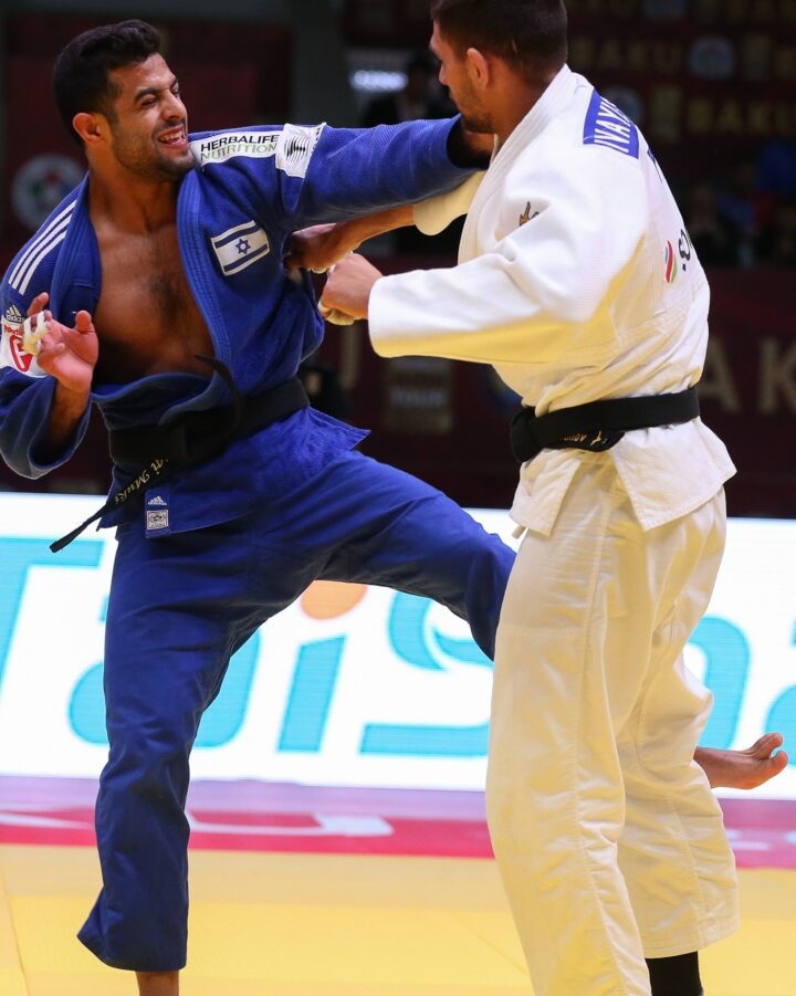 Israeli judoka Sagi Muki, left won a gold medal after his match against Ivaylo Ivanov of Bulgaria at the Baku Grand Slam 2019. Photo by Emanuele Di Feliciantonio/International Judo Federation