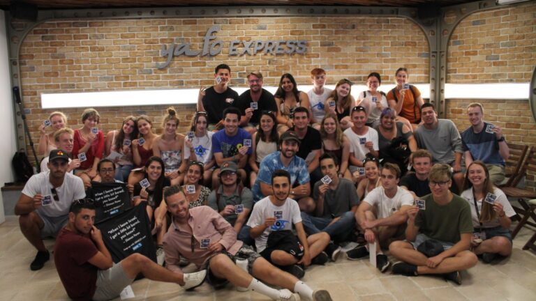 Students on the Birthright trip with Israel Outdoors learn about ISRAEL21c. Photo by Anna Wachspress