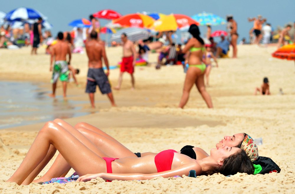 A spot of sunbathing on Ashkelon Beach. Photo by Shutterstock