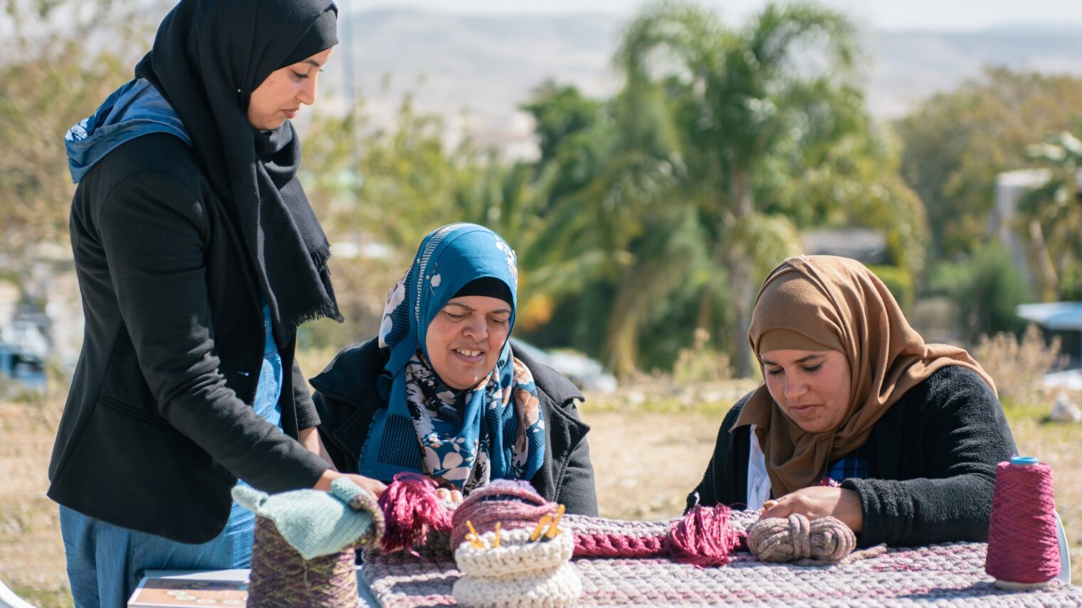 Israeli Bedouin women crocheting for the Iota Project. Photo by Via Tolila