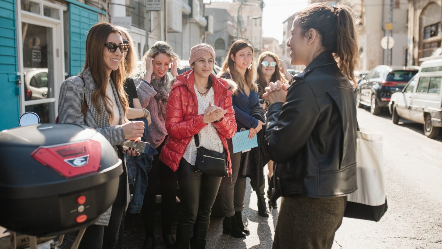 Liraz Cohen, right, leading a Fashionating by Liri tour in the Jaffa district of Tel Aviv. Photo by Shany Reich