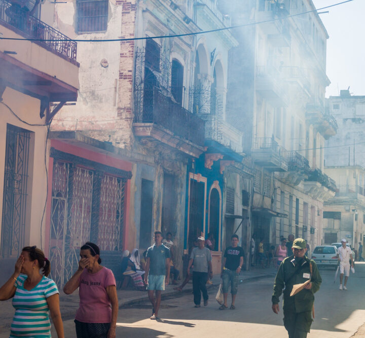 A Havana neighborhood being fumigated as a part of the fight against mosquitos carrying Zika virus in 2016. Photo by Matyas Rehak via Shutterstock.com