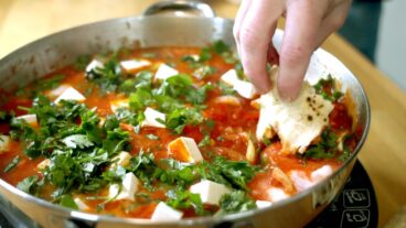 Eggs, tomato, peppers… the perfect shakshuka dish. Photo still from film