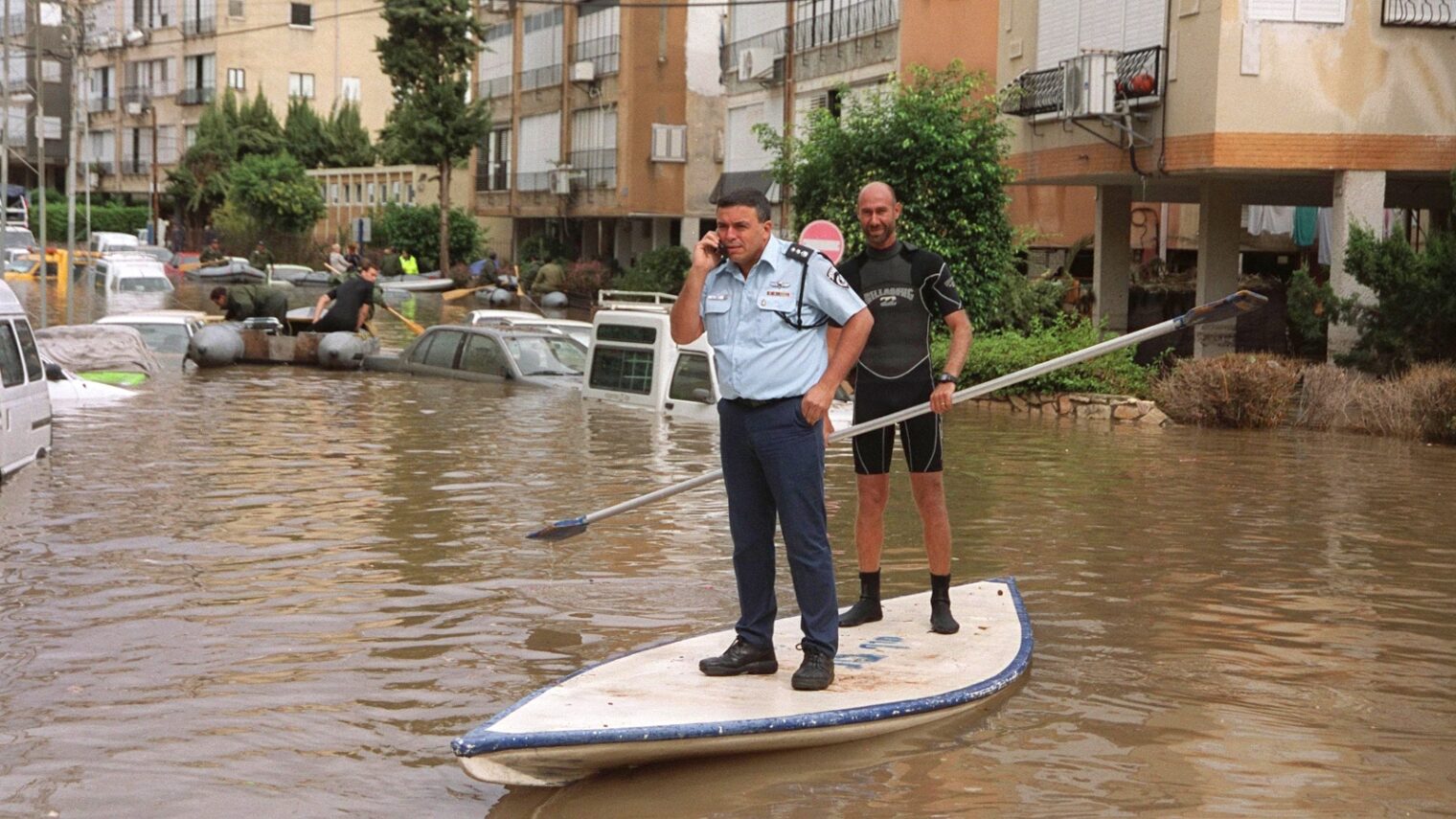 Bat Yam police in the seaside city of Bat Yam searching for trapped residents in need of rescuing. Credit: GPO