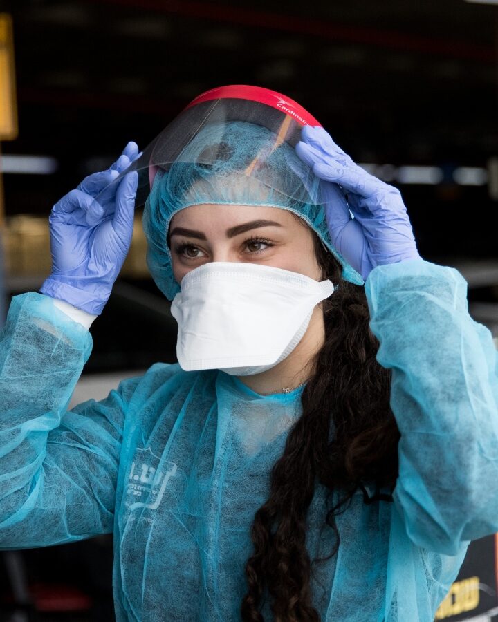 Hospital staff at Shaare Zedek Medical Center in Jerusalem donned facemasks and protective clothing to prepare for the arrival of a Chinese woman suspected of having coronavirus infection, January 27, 2020. Photo by Yonatan Sindel/Flash90