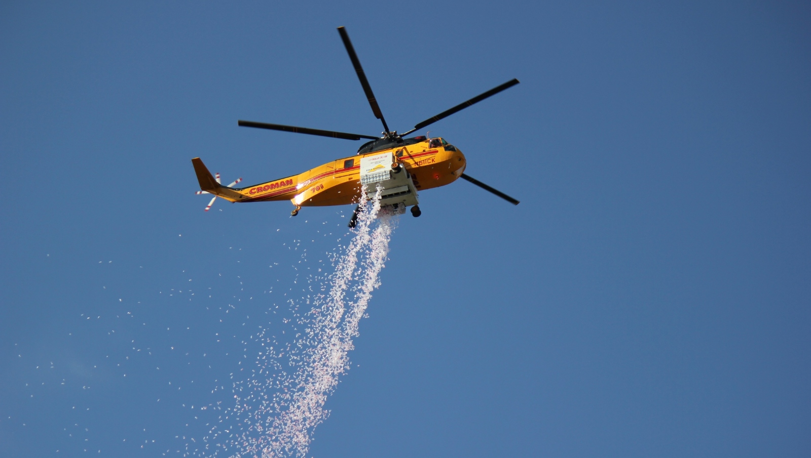 A helicopter releases HyDrop solution’s liquid pellets to extinguish fires. Photo courtesy of Elbit Systems