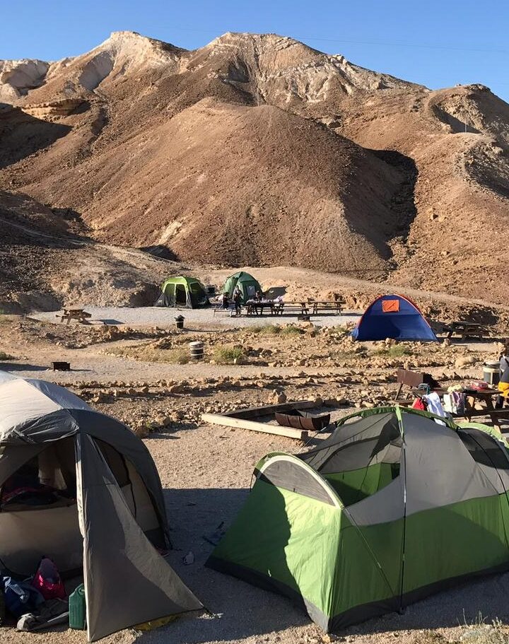 Pitch a tent at the foot of the majestic Masada mountain for a unique Israeli experience. Photo by Limor Katan Friedman/Israel Nature and Parks Authority