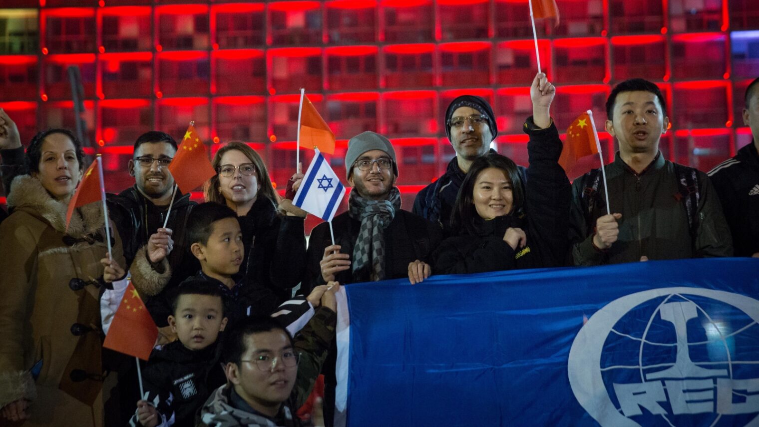 Members of the Chinese community in Israel held a solidarity rally in Tel Aviv on February 11, 2020, to show support of the Chinese people in fighting coronavirus. Photo by Miriam Alster/Flash90