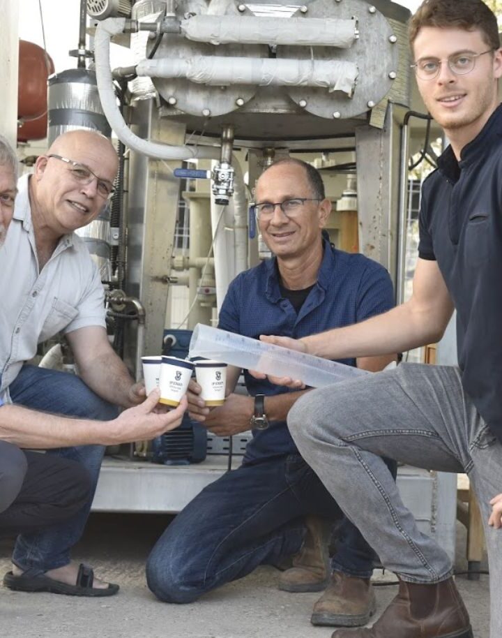 Prof. David Broday (left), Prof. Eran Frielder and their team enjoy drinking water generated from the air. Photo courtesy of the Technion