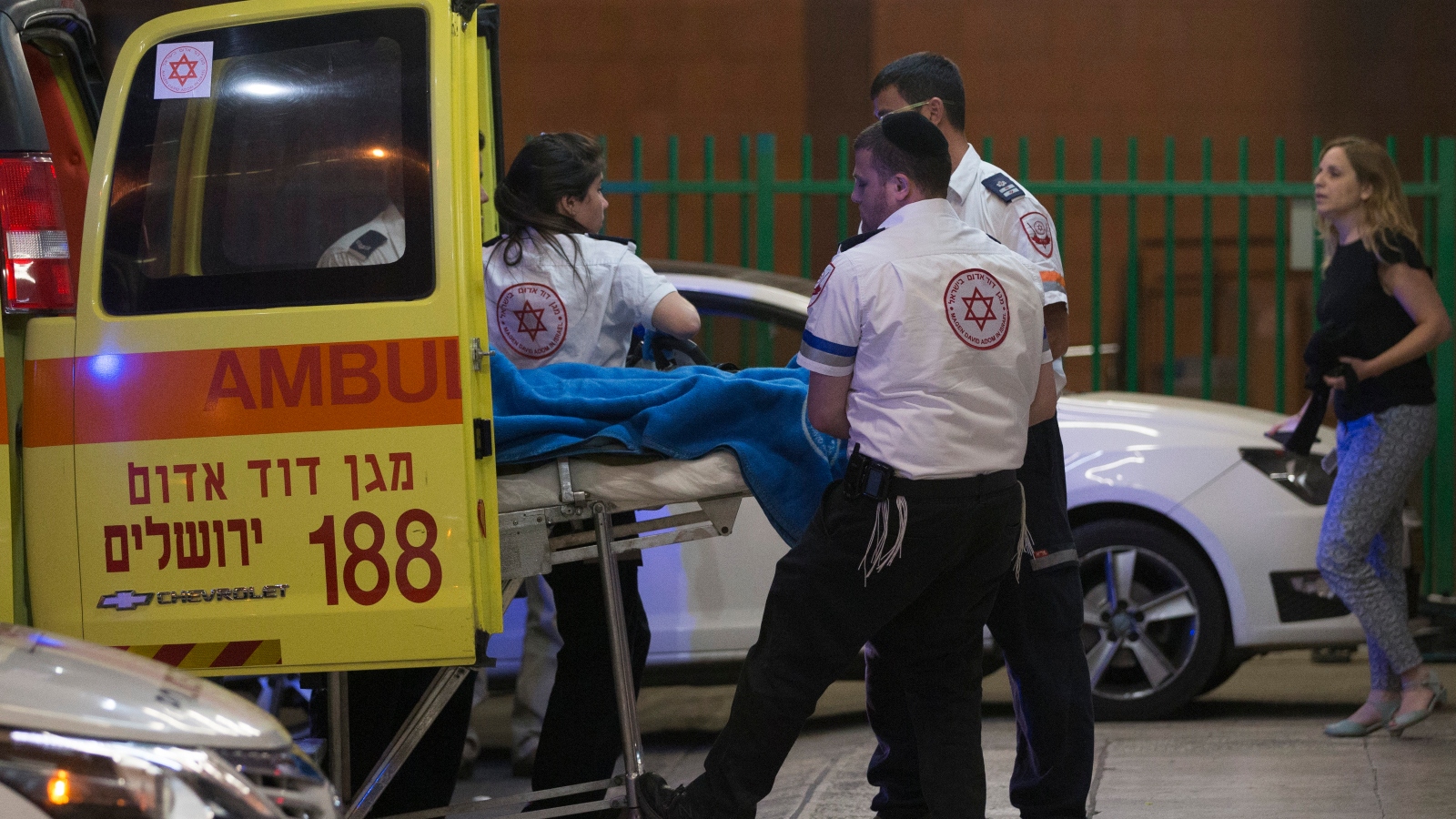 Israeli medics bring a patient to the emergency department of a Jerusalem hospital. Photo by Yonatan Sindel/Flash90