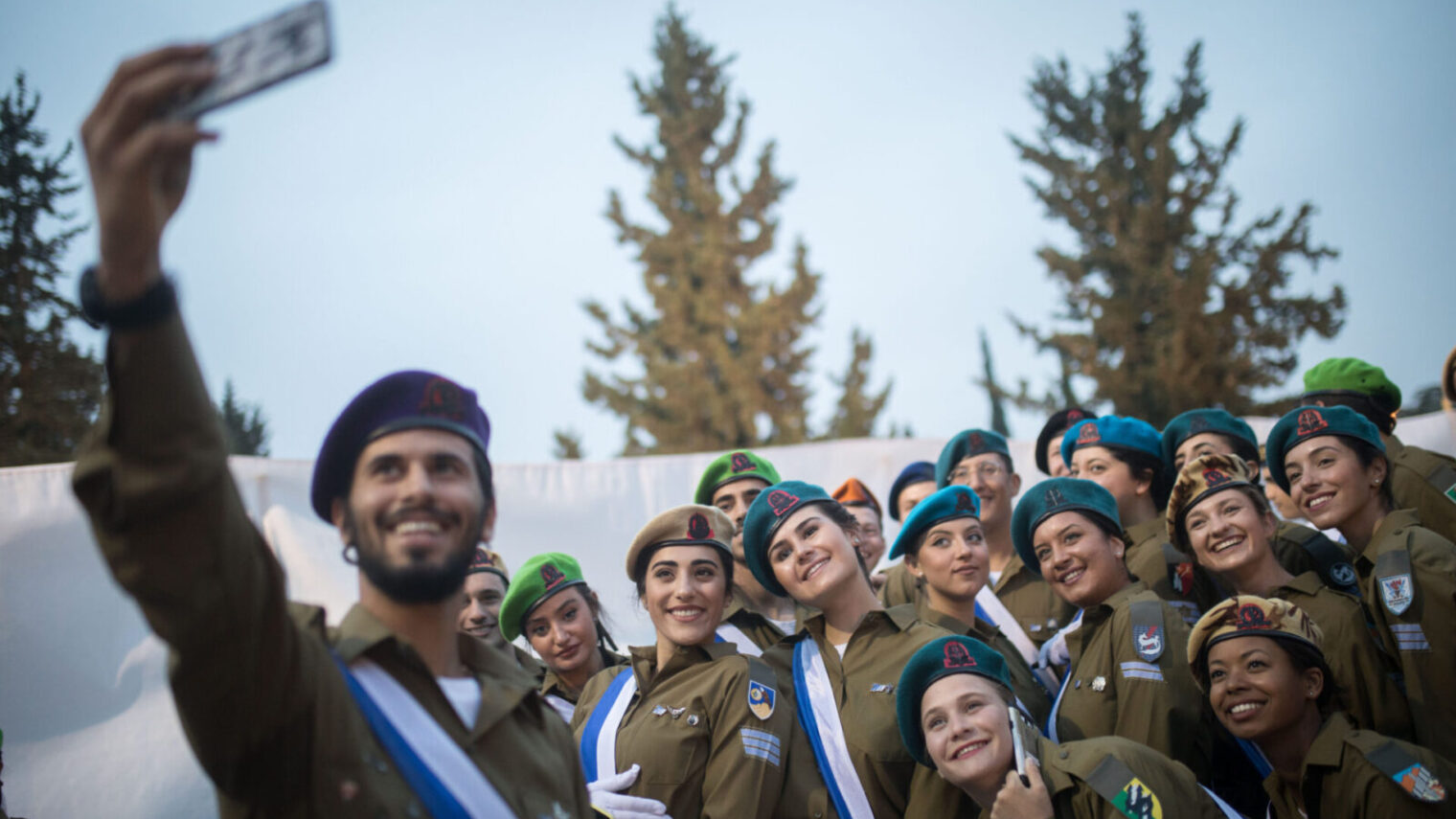 Israeli soldiers take a selfie at the 71st anniversary Independence Day ceremony at Mount Herzl, Jerusalem, on April 6, 2019. Photo by Hadas Parush/Flash90