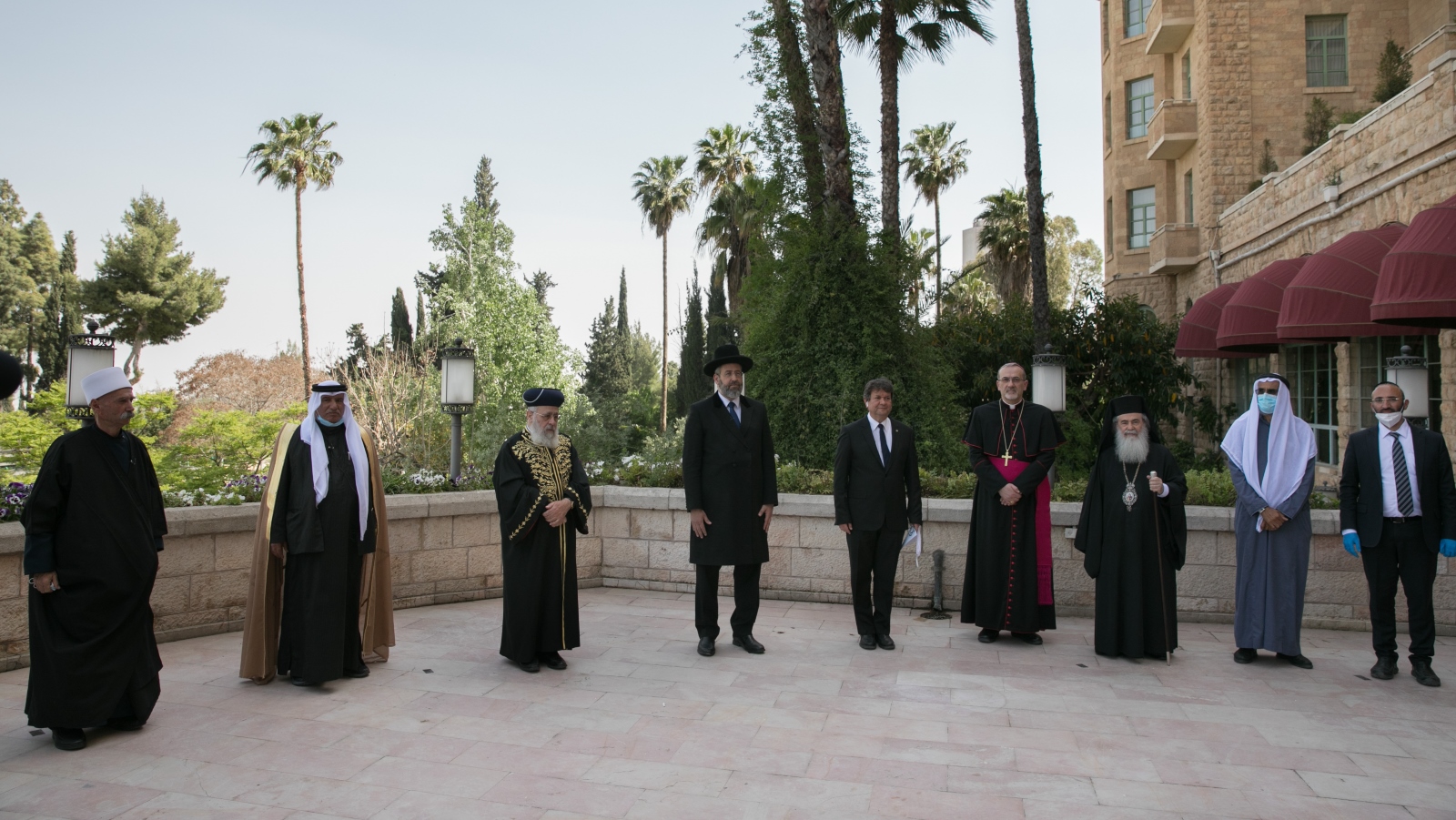 Spiritual leaders of all faiths attending a united prayer session outside the King David Hotel in Jerusalem, April 22, 2020. Photo by Olivier Fitoussi/Flash90