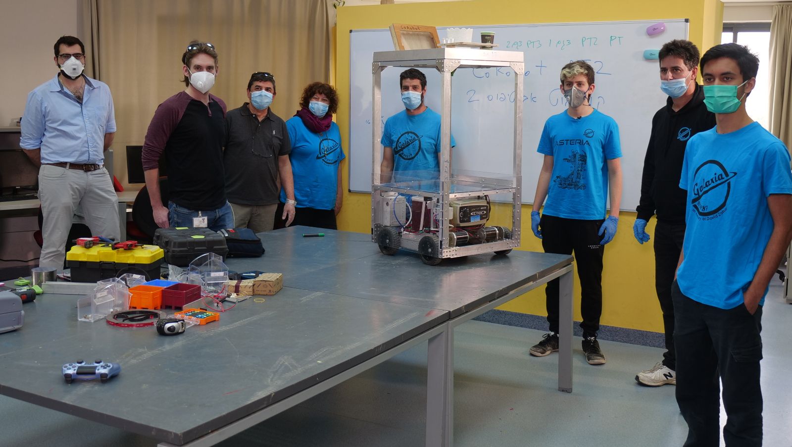 The Reali School’s robotics club and alumni with their CoRobot robotic prototype. Photo courtesy of Technion Spokesperson's Office