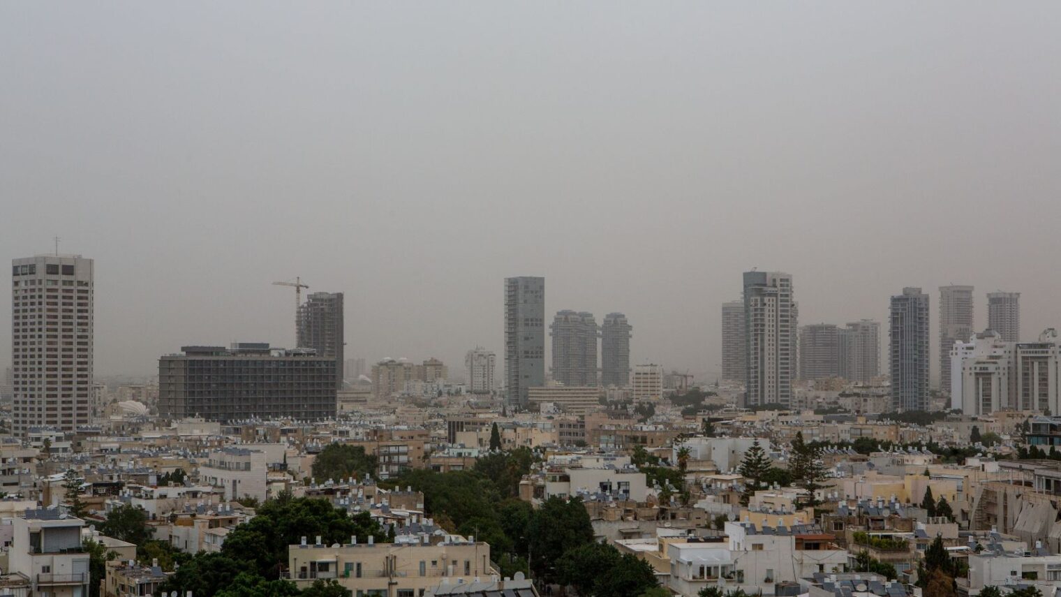 View over Tel Aviv on a hazy day. Urecsys knows how to bring in the cleanest outside air into buildings. Photo by Miriam Alster/Flash90