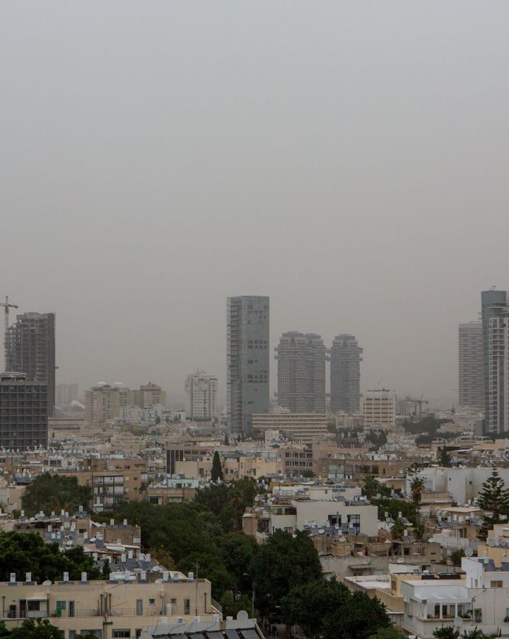 View over Tel Aviv on a hazy day. Urecsys knows how to bring in the cleanest outside air into buildings. Photo by Miriam Alster/Flash90