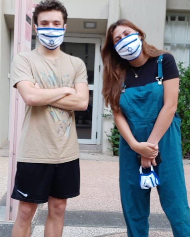 Tel Aviv University international students sporting the facemasks they received on Independence Day in May. Photo: courtesy