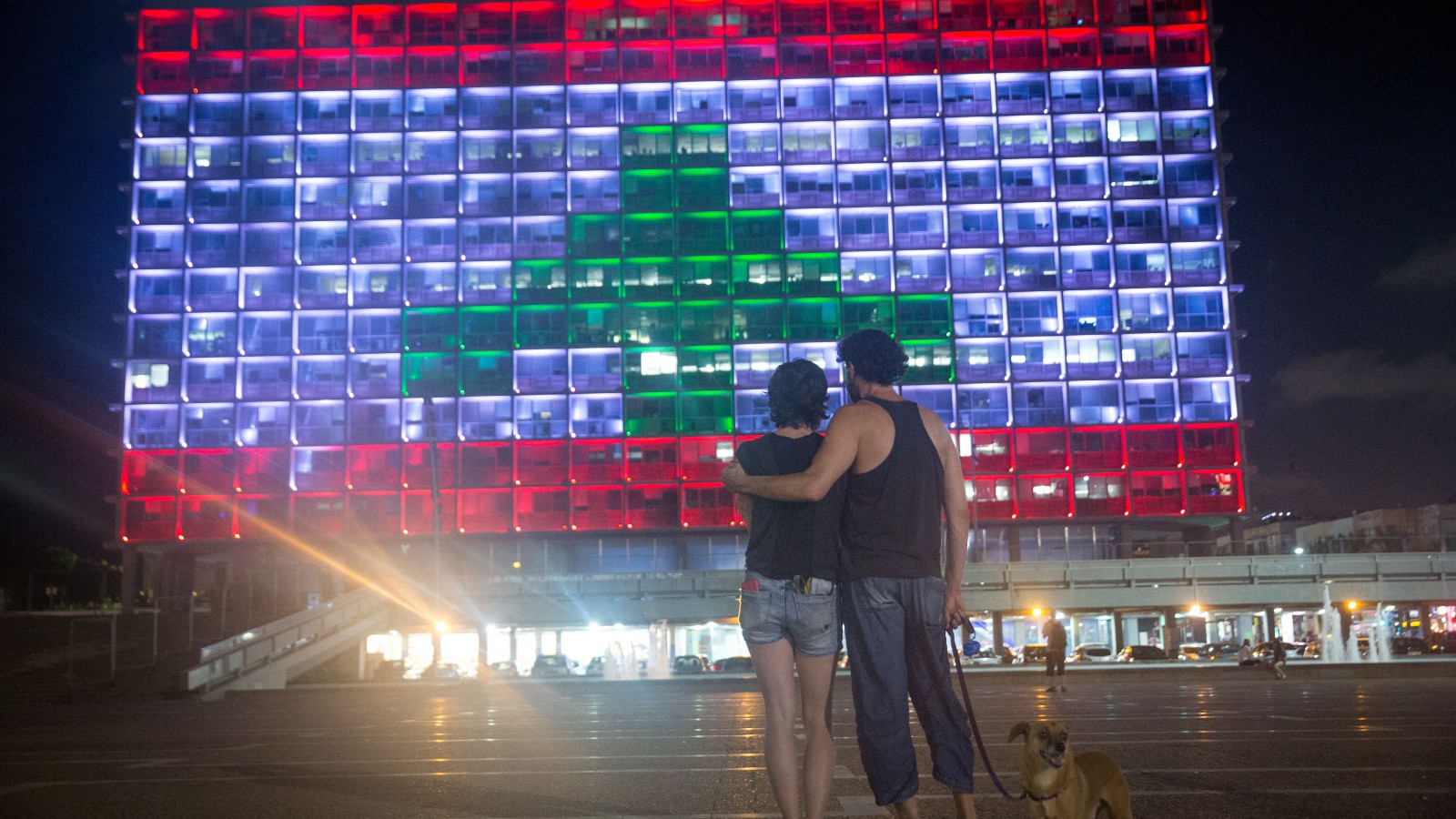The Tel Aviv-Yafo municipality building on Rabin Square was lit up on August 5, 2020, with the Lebanese flag in solidarity with the victims of the Beirut explosion. Photo by Miriam Alster/FLASH90