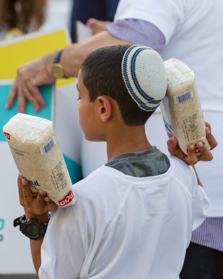 Latet volunteers packing emergency provisions for the needy during the Covid lockdown in Israel, April 2020. Photo: courtesy