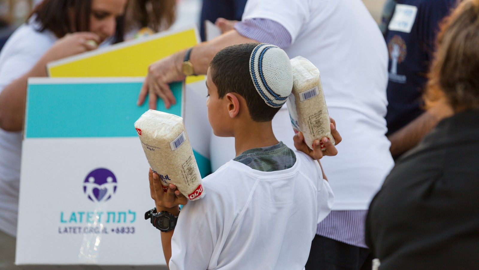 Latet volunteers packing emergency provisions for the needy during the Covid lockdown in Israel, April 2020. Photo: courtesy