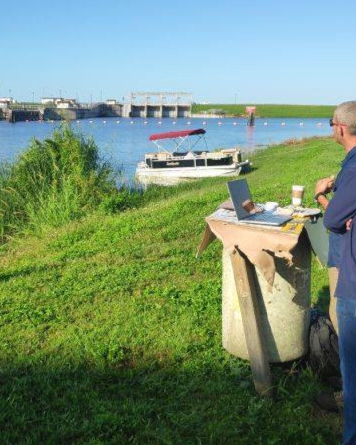 BlueGreen CTO Moshe Harel and Head of US Operations Waleed Nasser updating the Florida DEP about real-time algae conditions in Lake Okeechobee. Photo via Facebook