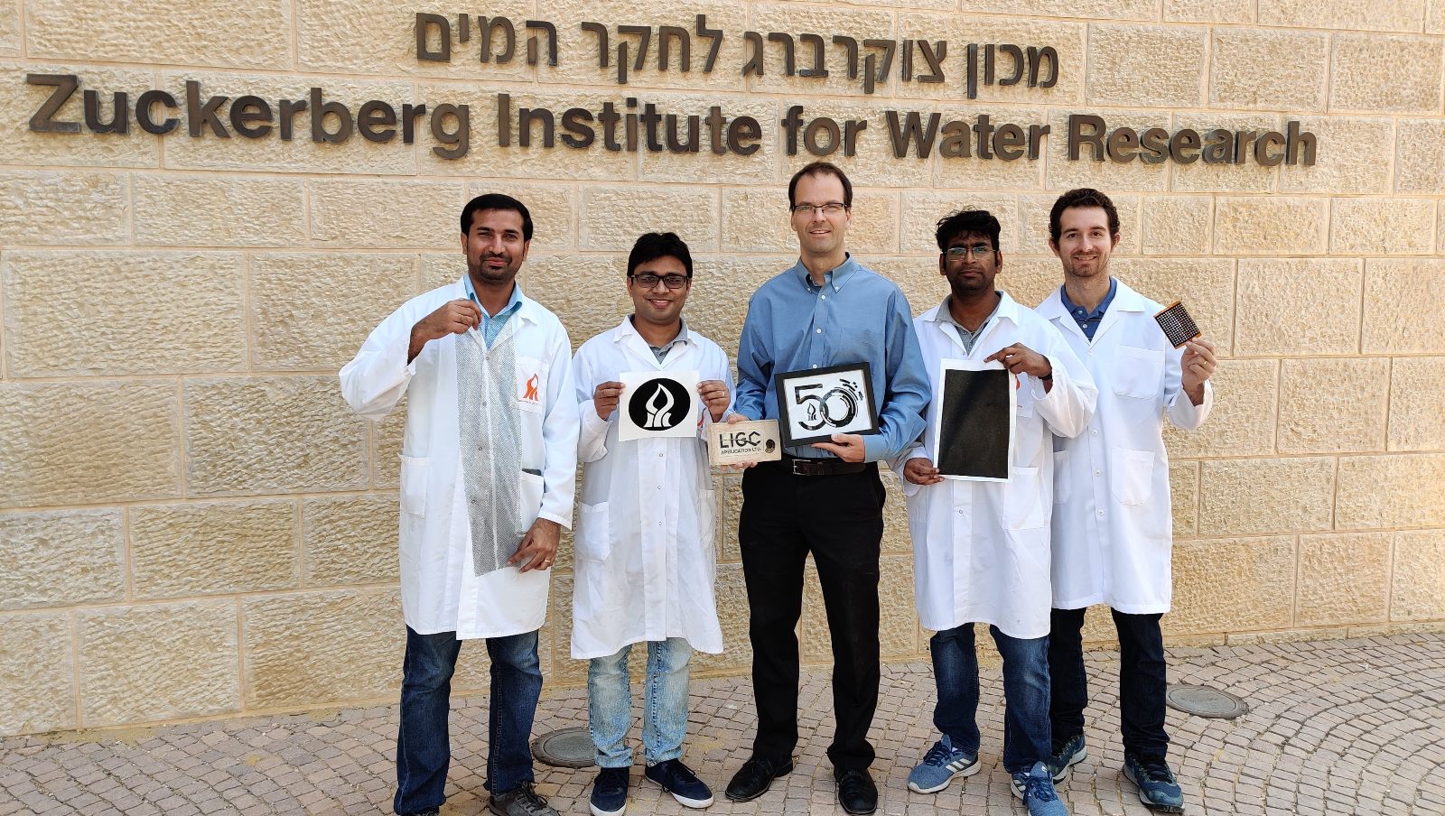 Ben-Gurion University researcher Chris Arnusch (center) and his research team. Photo: courtesy