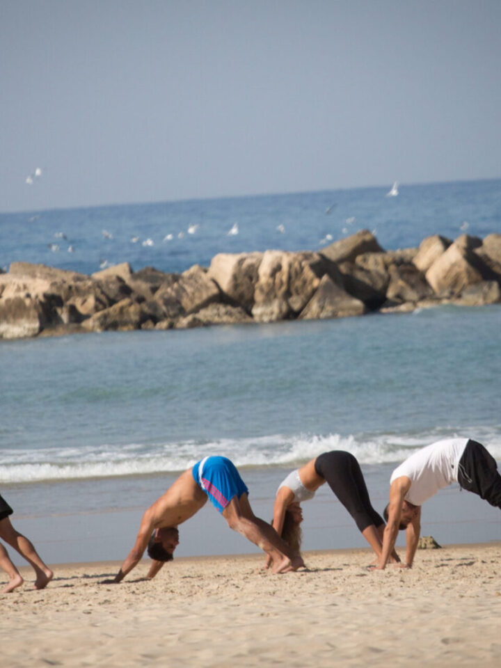 Israelis take their exercise to the beach in Tel Aviv during lockdown,December 30, 2020. Photo by Miriam Alster/Flash90