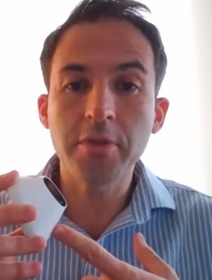 Screenshot of TytoCare’s Meni Shikhman showing his company’s device at TechfestNW in December 2020.