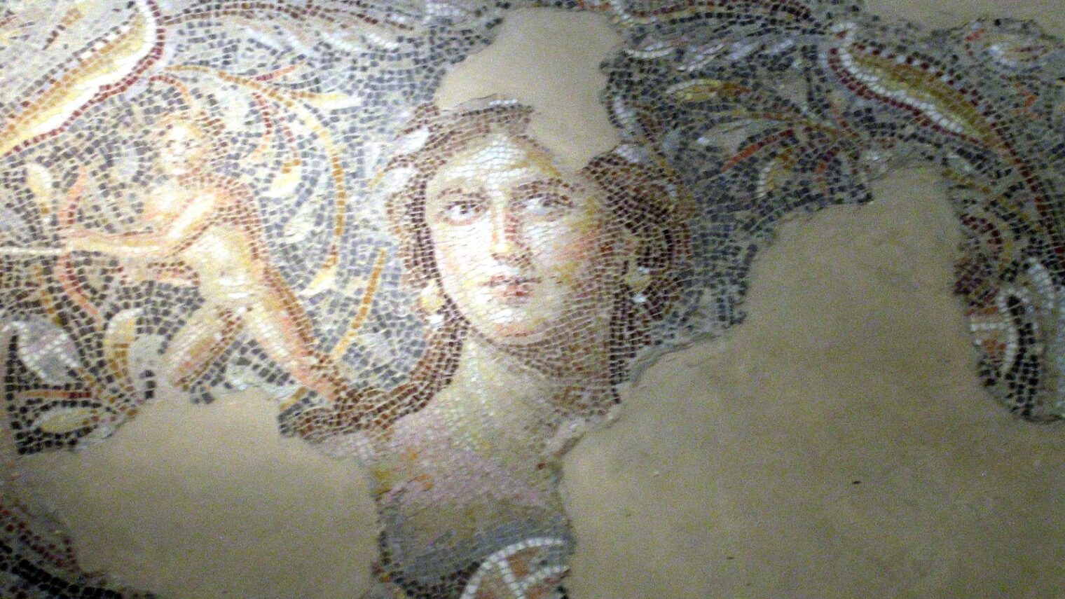 Dionysus House, another ancient villa found in Tzipori from the third century Roman period, contains the “Mona Lisa of the Galilee” -- a woman peeping up from the floor alongside images of Greek wine god Dionysus. Photo by Tomisti/Wikimedia Commons