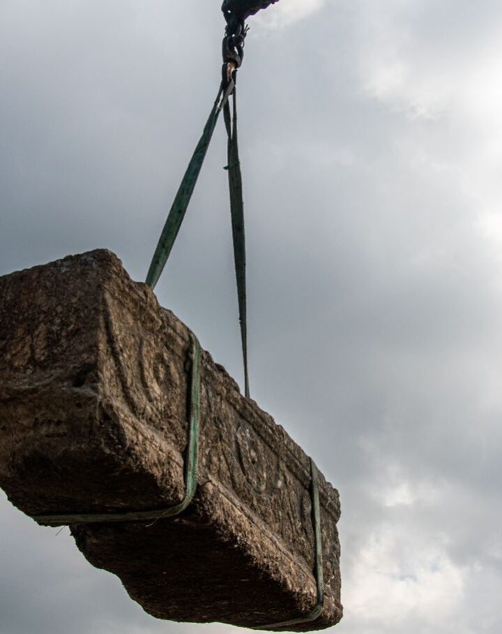 One of the ancient sarcophagi unearthed at the Ramat Gan Safari Park hangs high off the ground. Photo by Yoli Schwartz/Israel Antiquities Authority