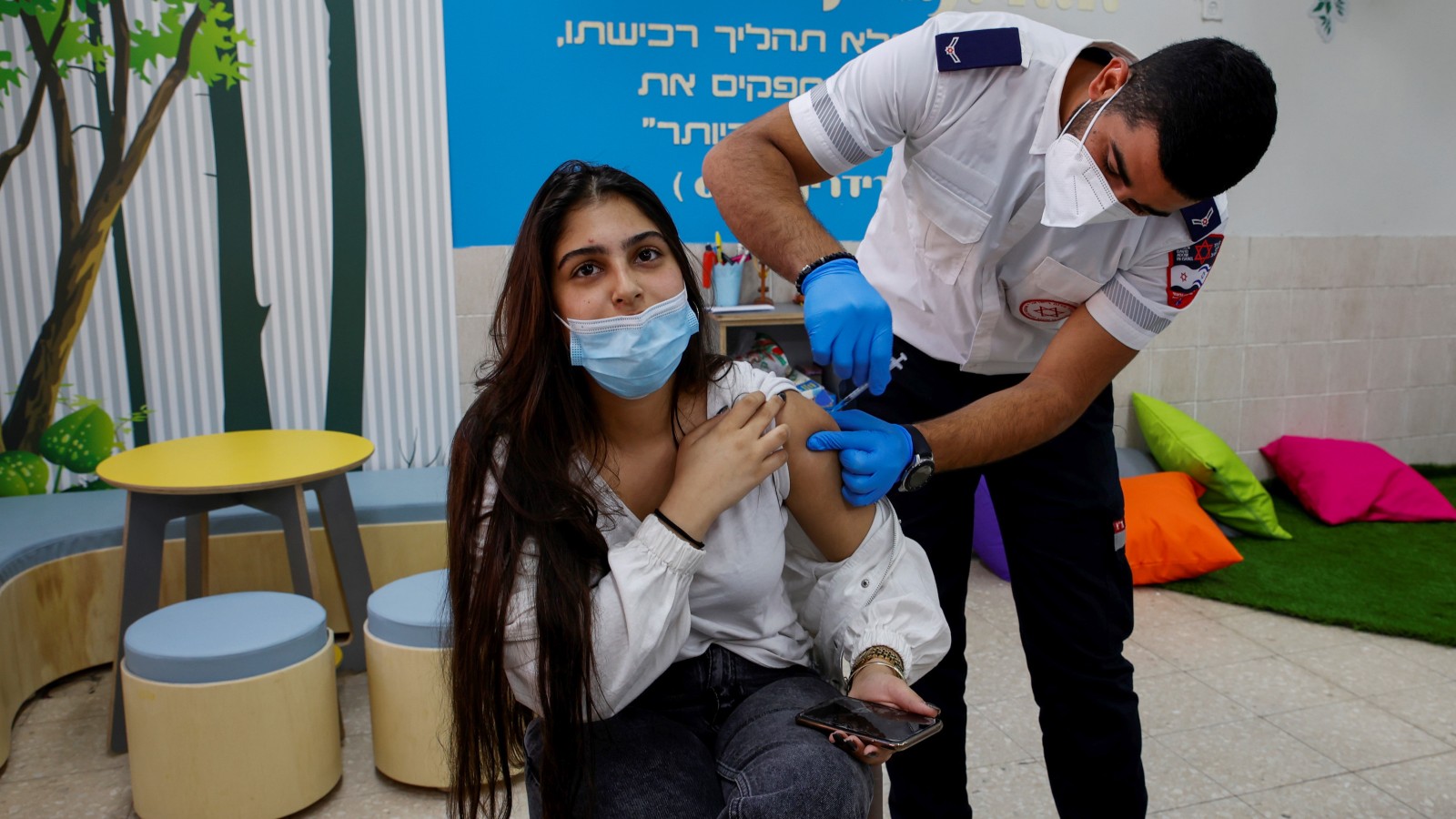 Israeli students receiving Covid-19 vaccines at Amal High School in Beersheva, March 17, 2021. Photo by Flash90