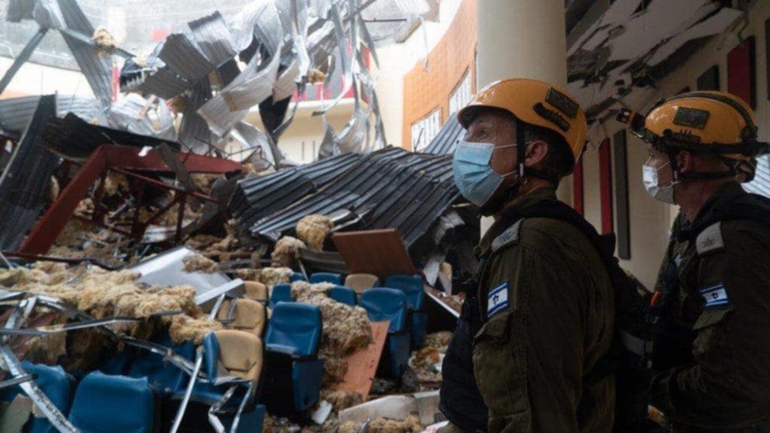 IDF emergency mission members assess damage in a collapsed building in Equatorial Guinea, March 2021.Photo courtesy of the IDF Spokesperson’s Unit