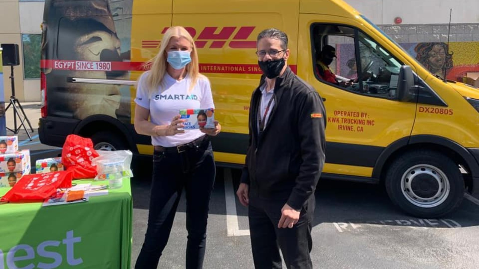 A SmartAID volunteer giving out PPE in Los Angeles County. Photo courtesy of SmartAID