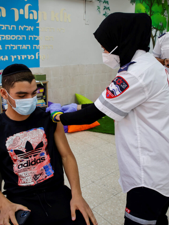 Israeli students at a school in Beersheva receive the Covid-19 vaccine injection. Photo by Flash90