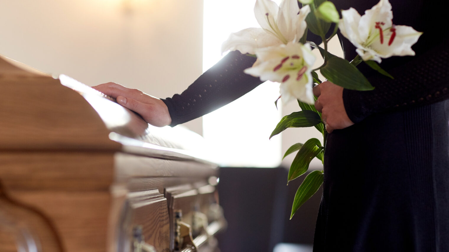 The funeral is often just the start of a long and difficult process. Photo by Shutterstock