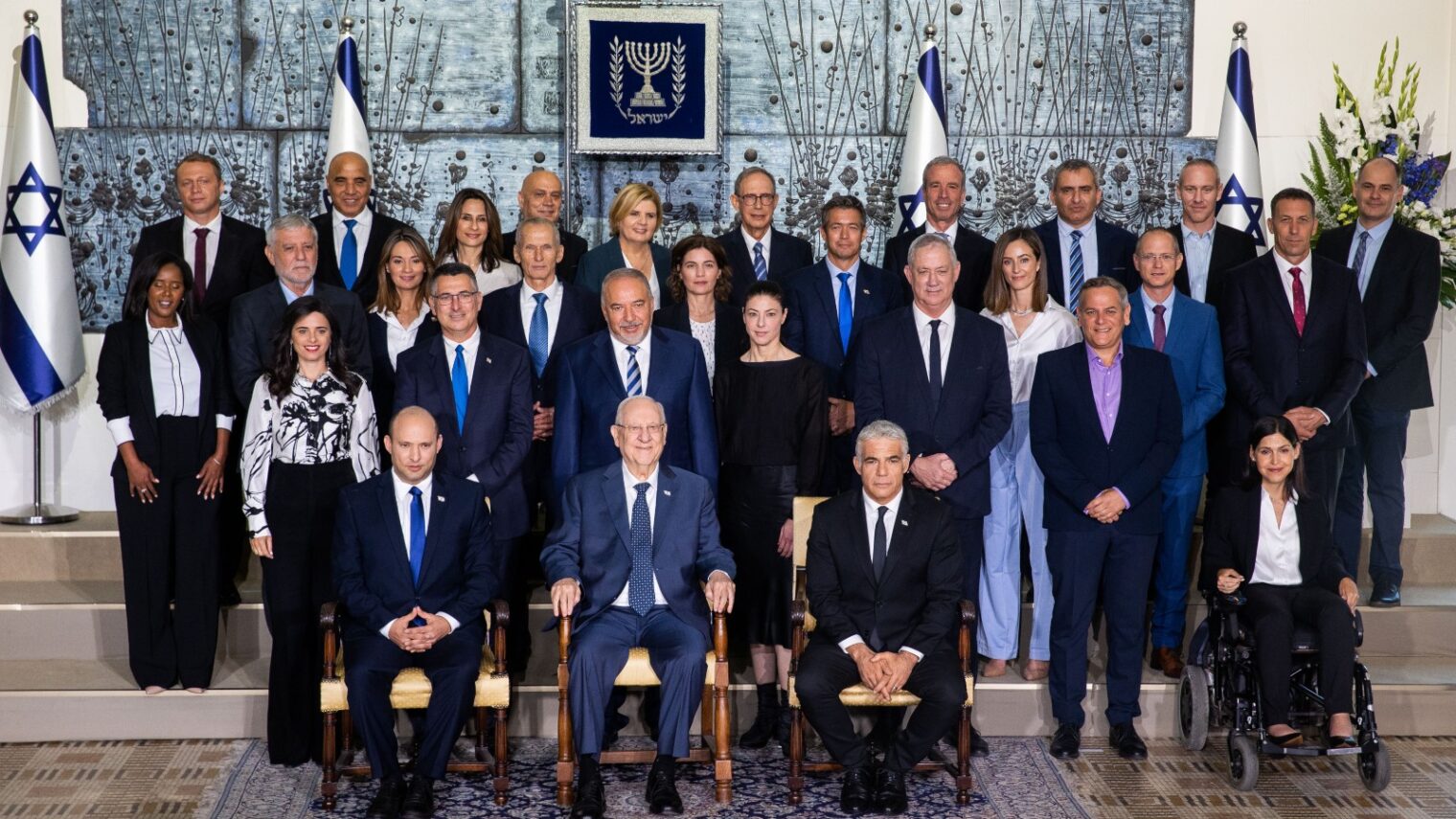 The newly sworn in Israeli government poses for a group photo at the President's Residence in Jerusalem, June 14, 2021. Photo by Yonatan Sindel/Flash90