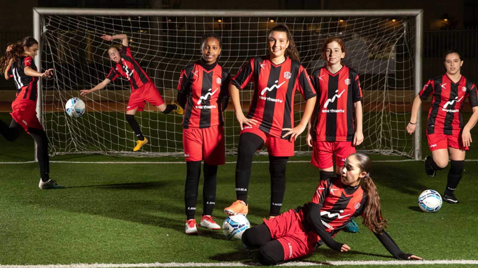 “Kicking Conventions to the Curb” depicts members of Jerusalem’s first soccer club for girls, Hapoel Katamon. Photo by Yoav Alon featured in Hamsa Aleinu