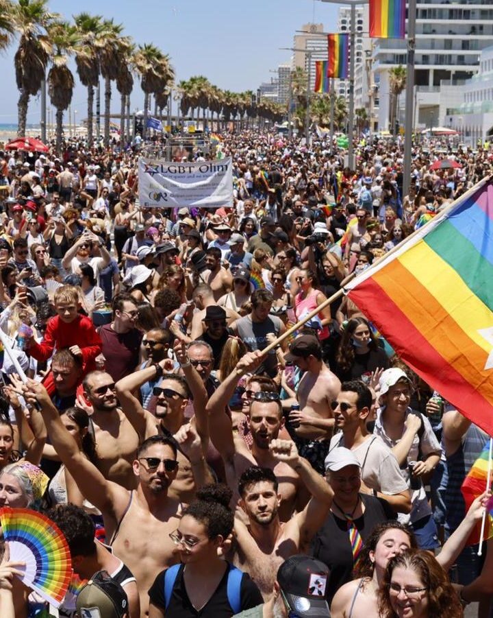 Participants march down the shoreline in the Tel Aviv Pride Parade held on June 25, 2021. Photo by Guy Yechiely