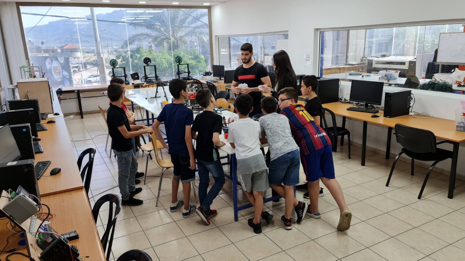 Arab and Jewish schoolchildren gather in Majd al-Krum for hands-on science activities. Photo courtesy of Moona