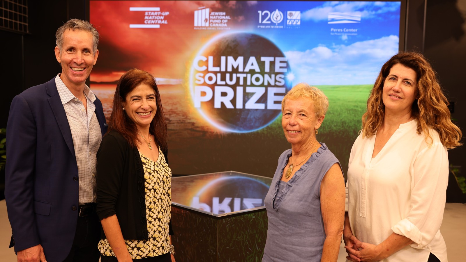 From left, Climate Solutions Prize Executive Chair Jeff Hart; Start-Up Nation Central VP of Philanthropic Partnerships Laura Gilinski; Chair of KKL’s Board Committee for Environment and Science Emily Levy-Shochat; and Efrat Duvdevani, director of the Peres Center for Peace and Innovation. Photo by Eyal Marilus