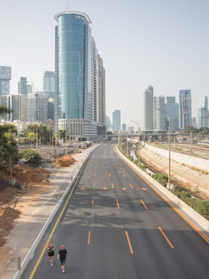 Israelis jog along the empty Ayalon highway in Tel Aviv on Yom Kippur. Photo by  Miriam Alster/Flash90