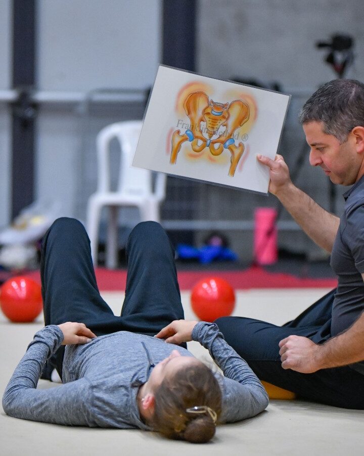 Dr. Amit Abraham teaching an Israeli rhythmic gymnast to use mental imagery for enhanced performance. Photo by Alon Stern