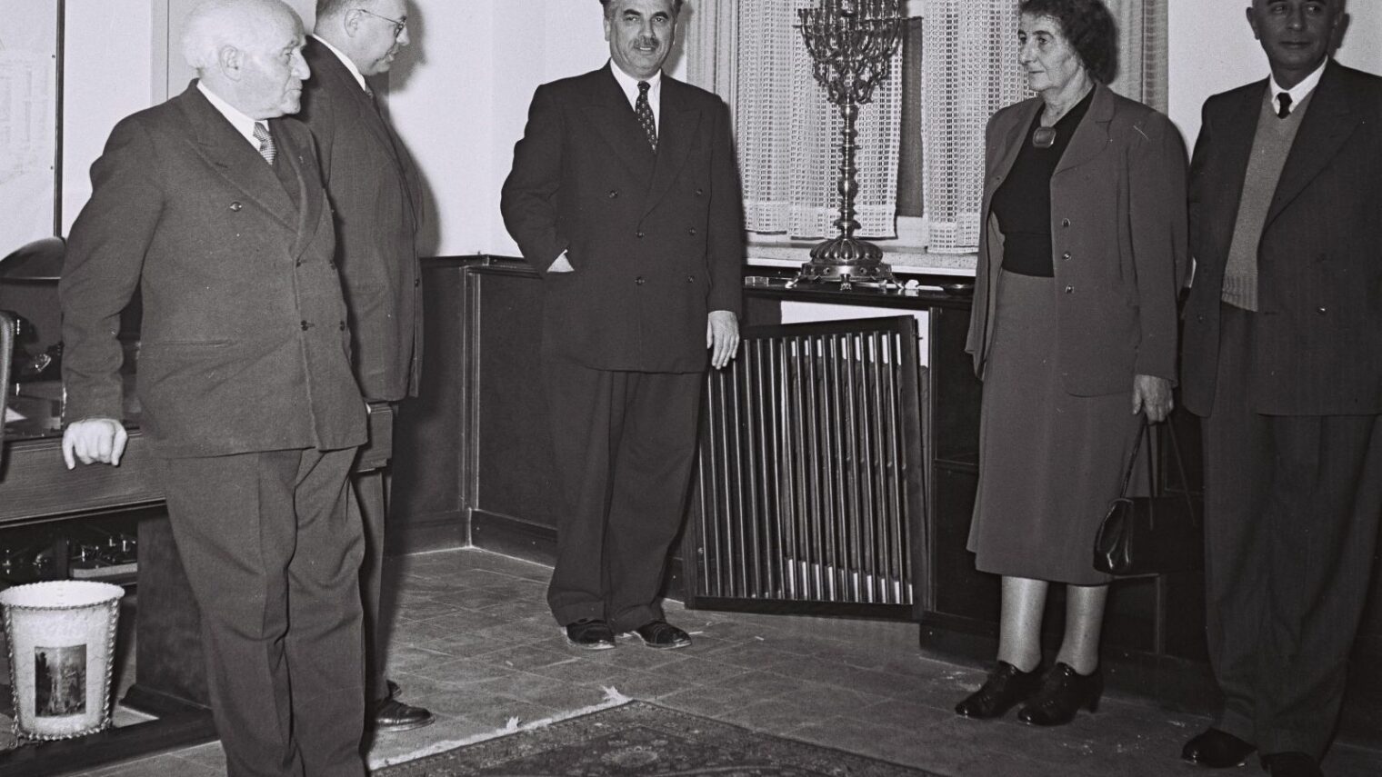 Government leaders including Golda Meir and David Ben Gurion gather for a candle-lighting ceremony after a cabinet meeting in 1953. Photo by David Eldan/Government Press Office