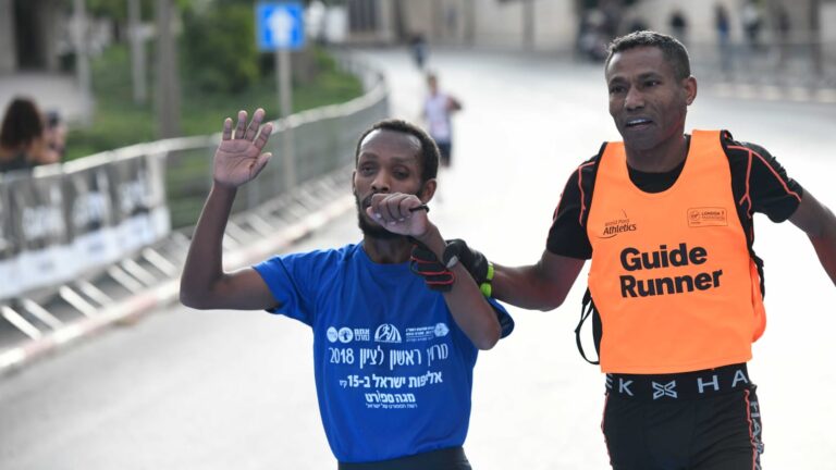 Avi Solomon, left, running with Lior Berhano. Photo courtesy of Justine Zwerling