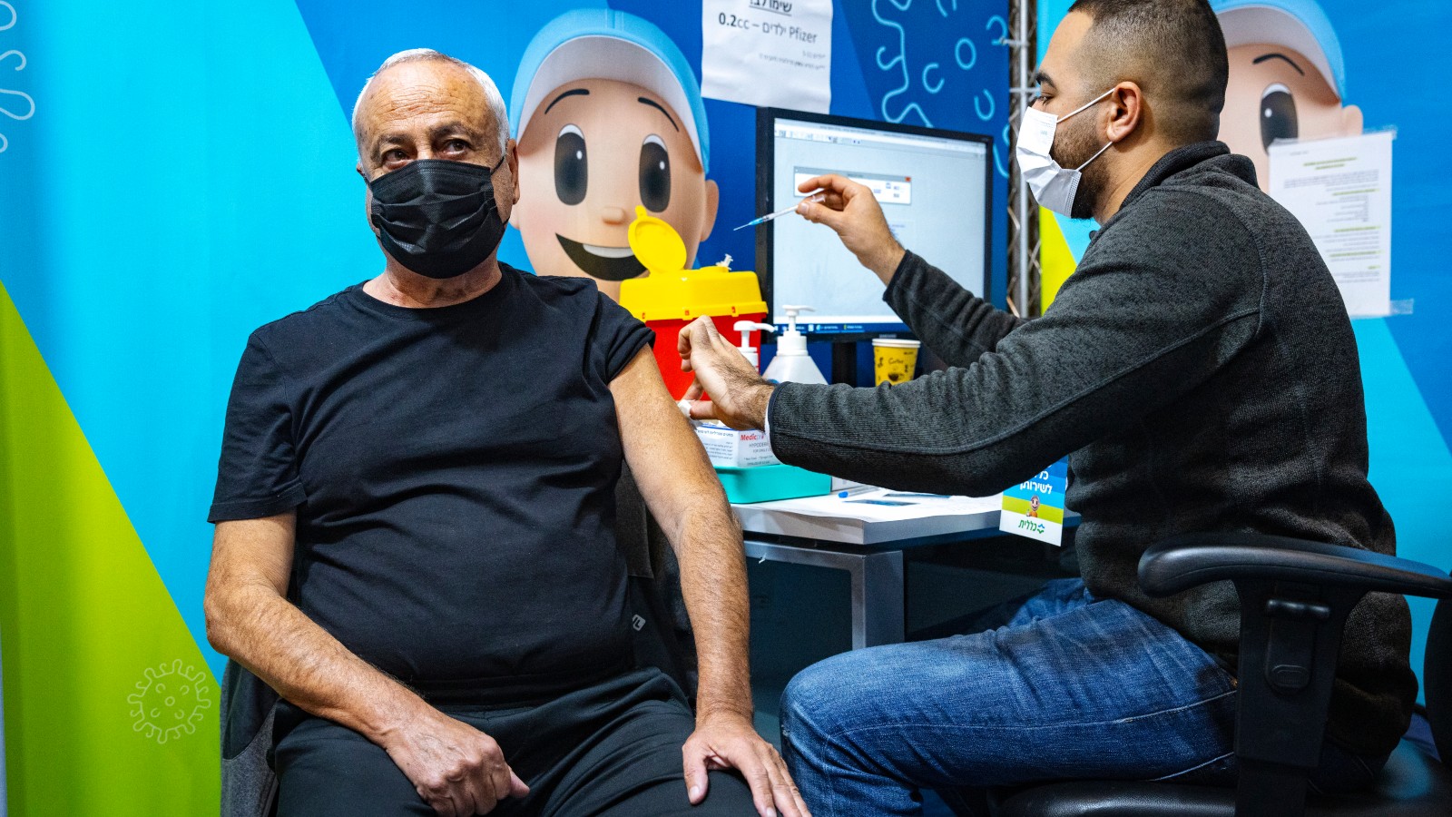 Israeli adults over the age of 60 began receiving a fourth dose of the Pfizer Covid-19 vaccine on January 3, 2022. Photo by Olivier Fitoussi/Flash90