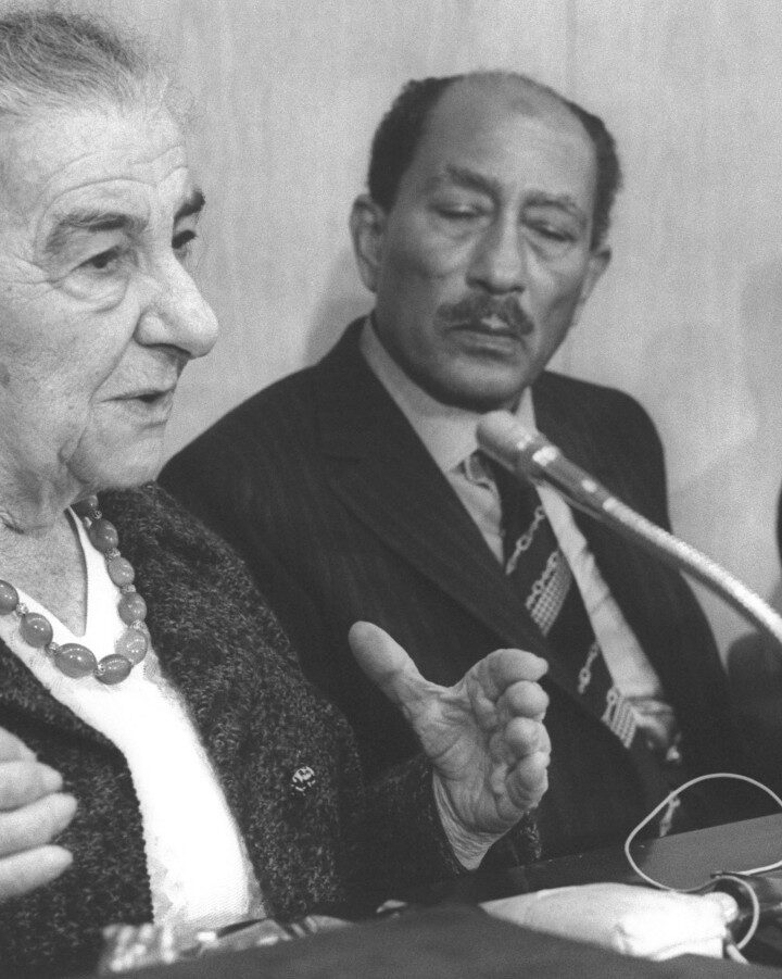 Golda Meir speaking at the historic visit of Egyptian President Anwar Sadat (center) on November 21, 1977, with Shimon Peres to the right. Photo by Ya’acov Sa’ar/GPO