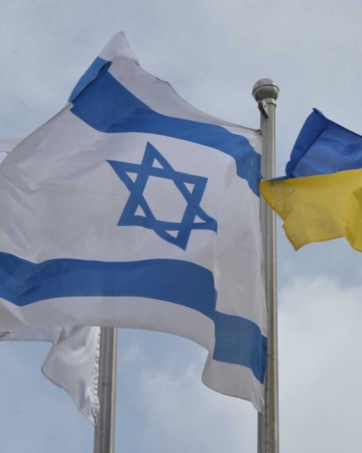 The Israeli and Ukrainian flags flutter atop Hebrew University’s Mount Scopus campus in Jerusalem. Photo by Bruno Cherbit