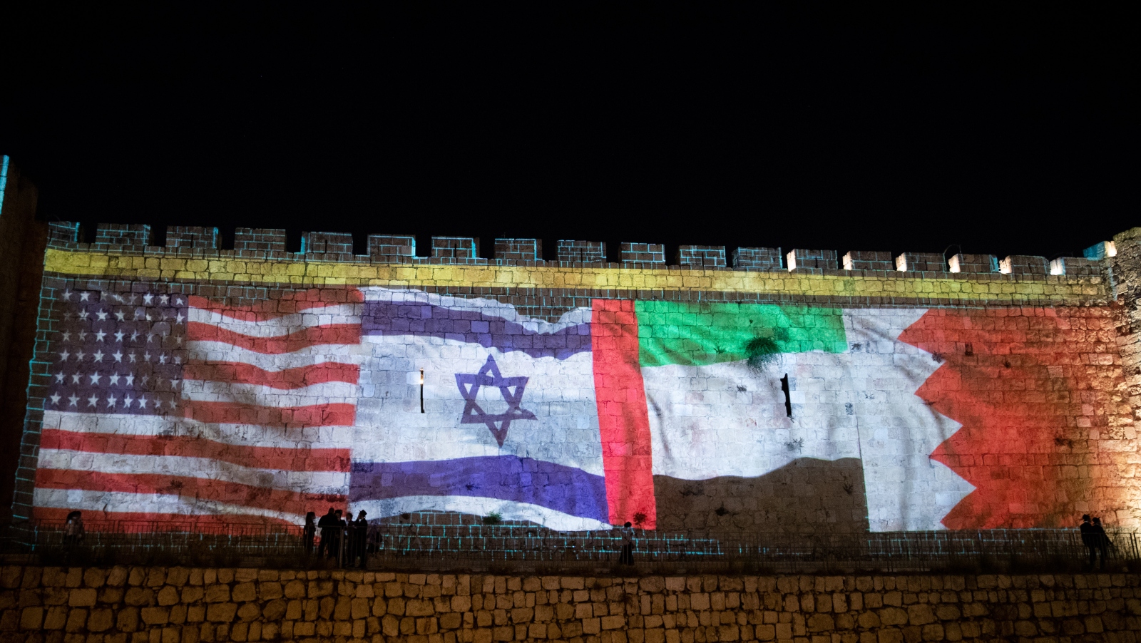 The flags of the US, UAE, Israel and Bahrain are screened on the walls of Jerusalem's Old City in celebration of the Abraham Accords in September 2020. Photo by Yonatan Sindel/Flash90